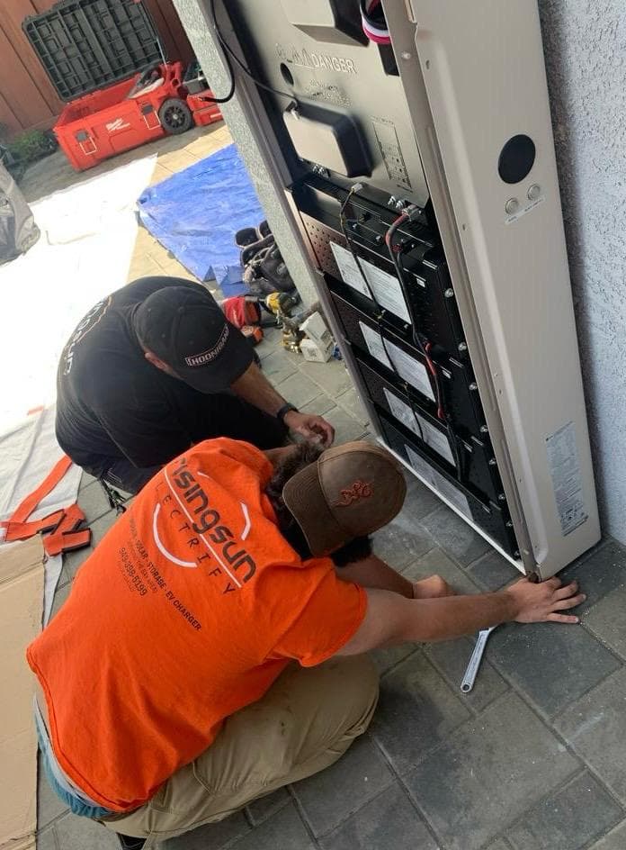 Energy storage batteries mounted on exterior wall