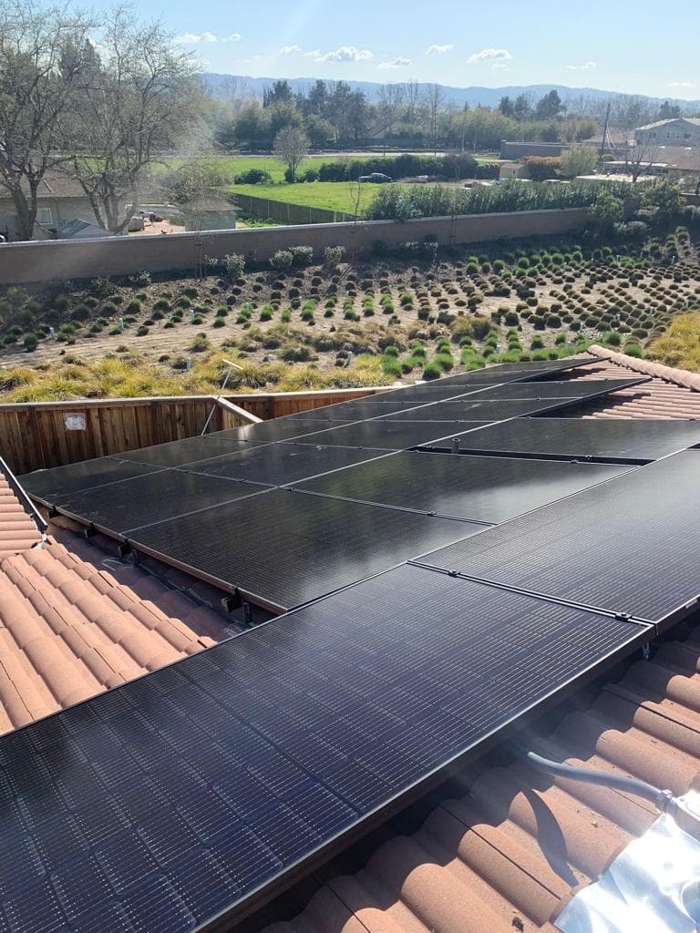 Aerial view of rooftop solar installation