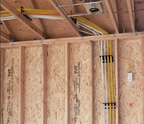 Residential electrical wiring during home construction
